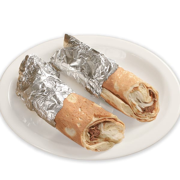 Two partially unwrapped Pakistani beef rolls with onions and foil on a white plate.